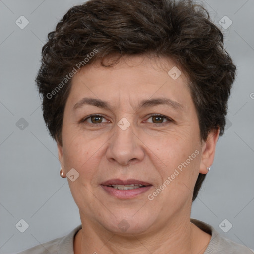 Joyful white adult female with short  brown hair and brown eyes