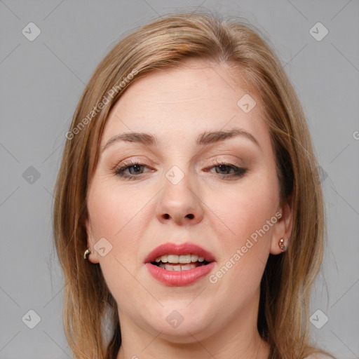 Joyful white young-adult female with medium  brown hair and blue eyes