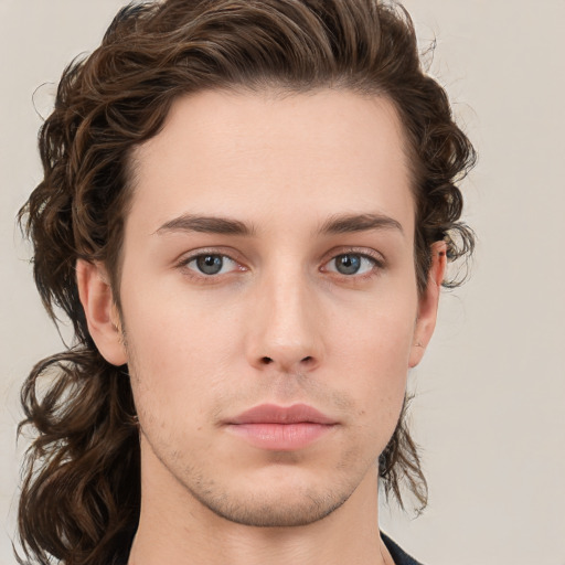 Neutral white young-adult male with medium  brown hair and brown eyes