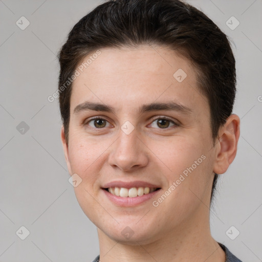 Joyful white young-adult female with short  brown hair and grey eyes