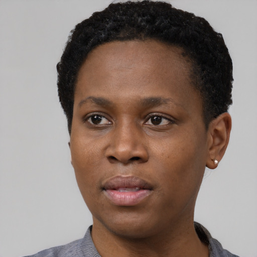 Neutral black young-adult female with short  black hair and brown eyes