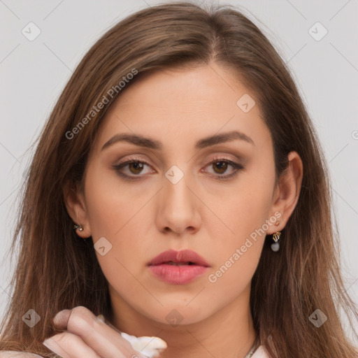 Neutral white young-adult female with long  brown hair and brown eyes