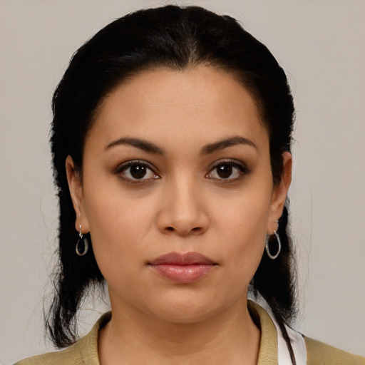 Neutral latino young-adult female with medium  black hair and brown eyes