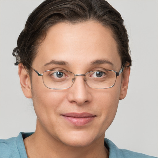 Joyful white adult female with short  brown hair and brown eyes