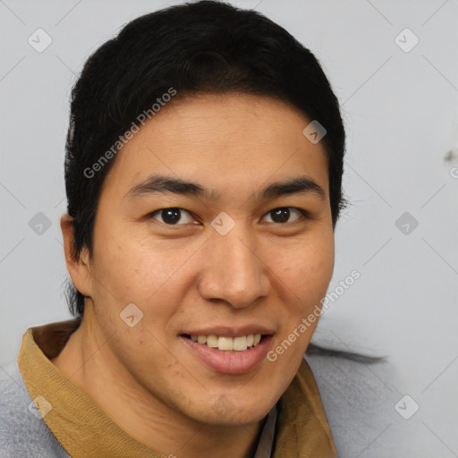 Joyful asian young-adult male with short  brown hair and brown eyes