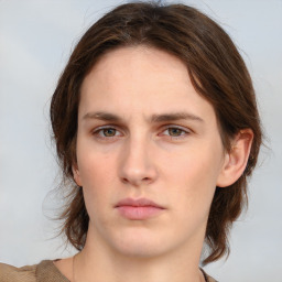 Neutral white young-adult female with medium  brown hair and grey eyes