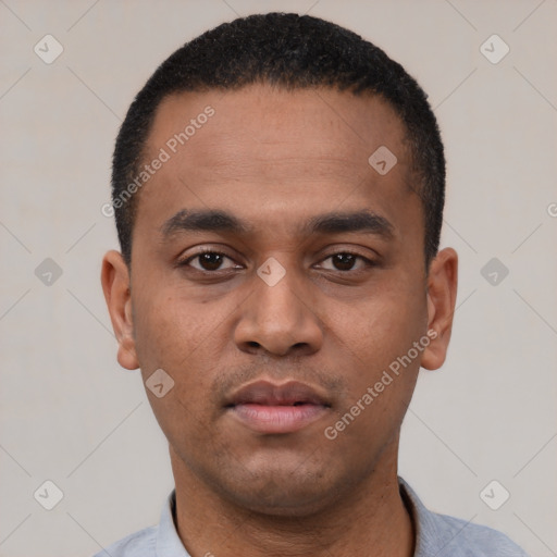 Neutral latino young-adult male with short  black hair and brown eyes