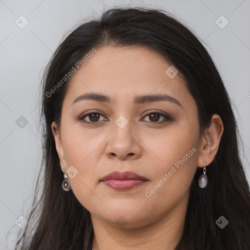 Joyful latino young-adult female with long  brown hair and brown eyes