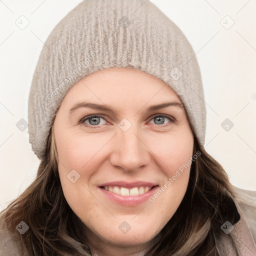 Joyful white young-adult female with long  brown hair and grey eyes