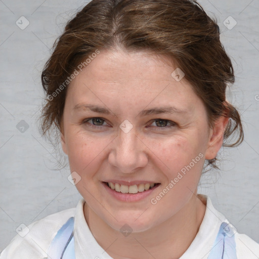 Joyful white young-adult female with medium  brown hair and blue eyes