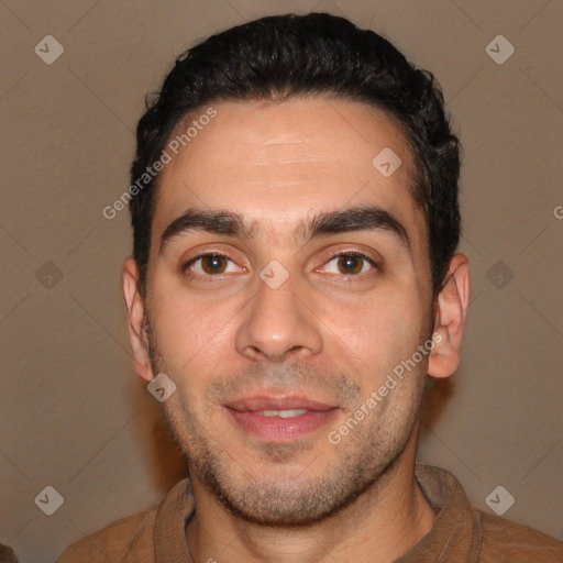 Joyful white young-adult male with short  black hair and brown eyes