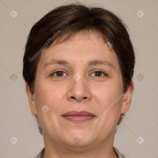 Joyful white adult female with short  brown hair and grey eyes