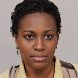 Neutral black young-adult female with short  brown hair and brown eyes