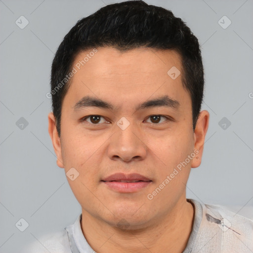 Joyful latino young-adult male with short  black hair and brown eyes