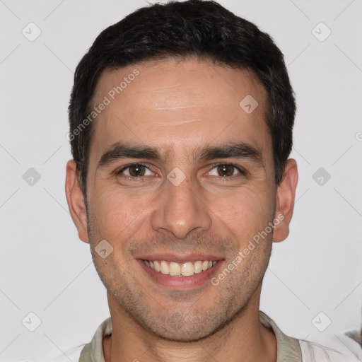 Joyful white young-adult male with short  brown hair and brown eyes