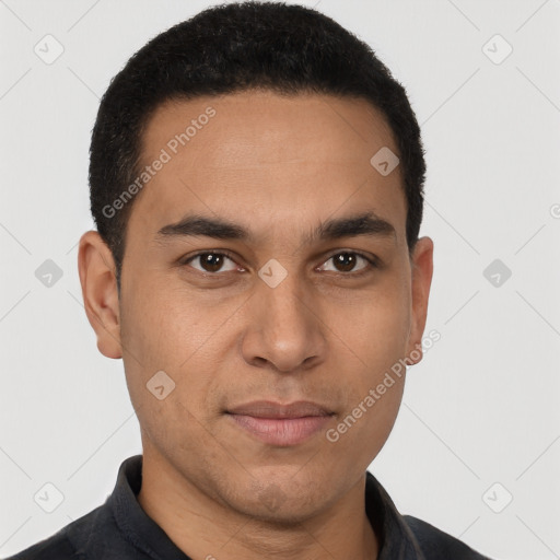 Joyful latino young-adult male with short  brown hair and brown eyes