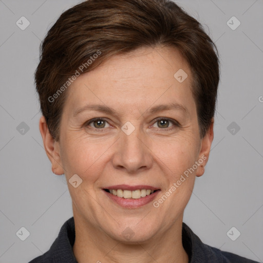 Joyful white adult female with short  brown hair and grey eyes