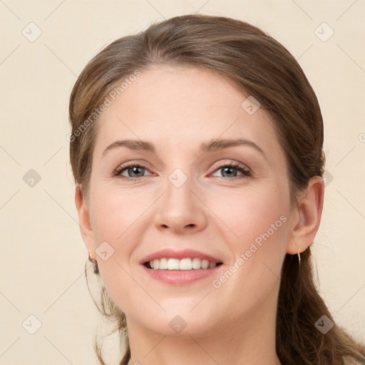 Joyful white young-adult female with long  brown hair and grey eyes