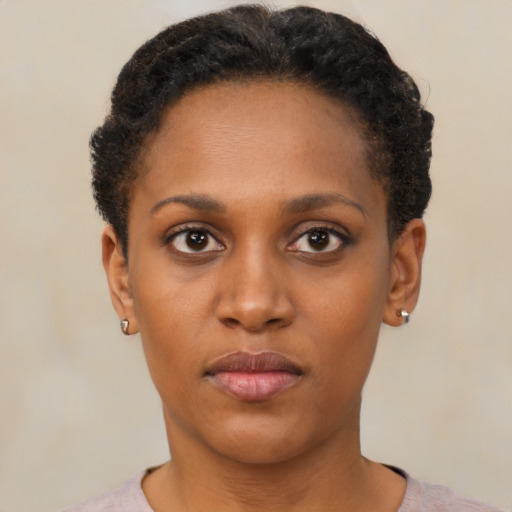 Neutral black young-adult female with short  brown hair and brown eyes