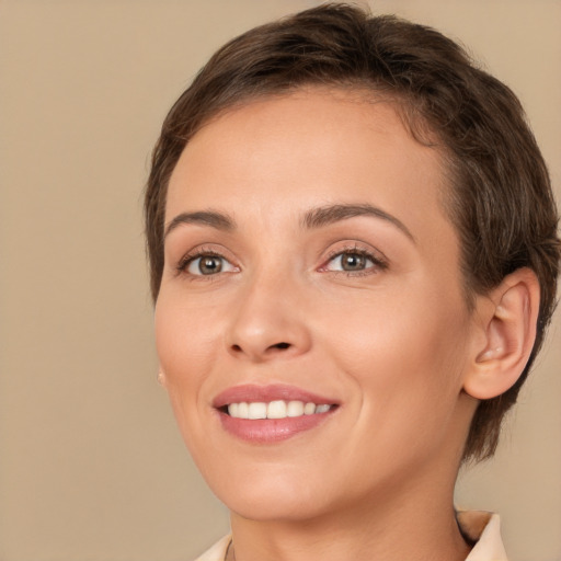 Joyful white young-adult female with medium  brown hair and brown eyes