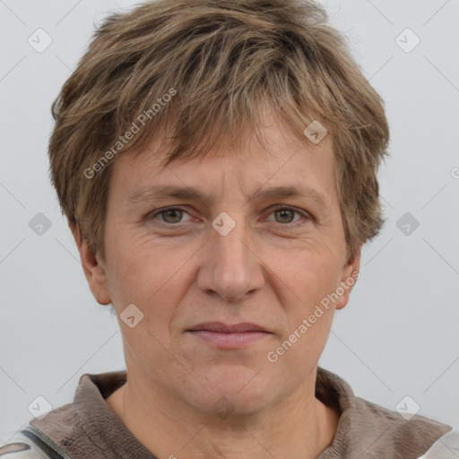 Joyful white adult male with short  brown hair and grey eyes