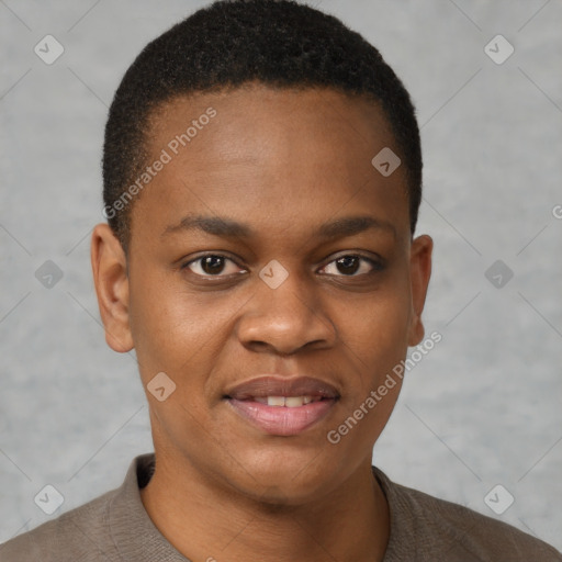 Joyful black young-adult female with short  brown hair and brown eyes