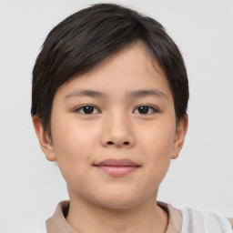 Joyful asian child female with short  brown hair and brown eyes