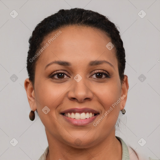 Joyful black young-adult female with short  brown hair and brown eyes