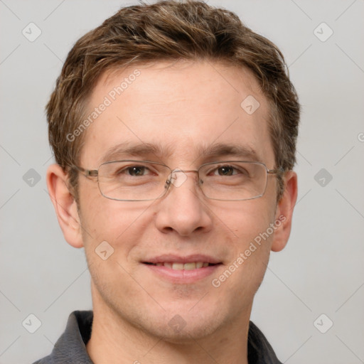 Joyful white adult male with short  brown hair and grey eyes