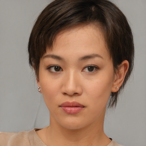 Neutral asian young-adult female with medium  brown hair and brown eyes