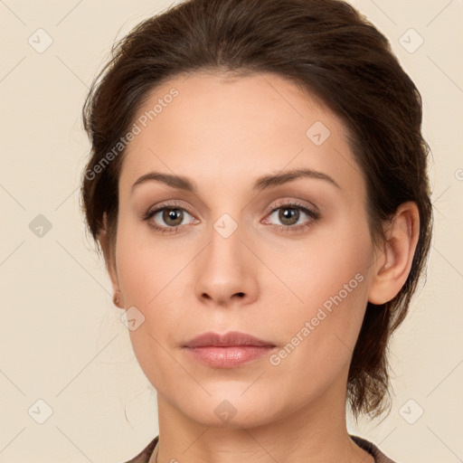 Neutral white young-adult female with medium  brown hair and brown eyes