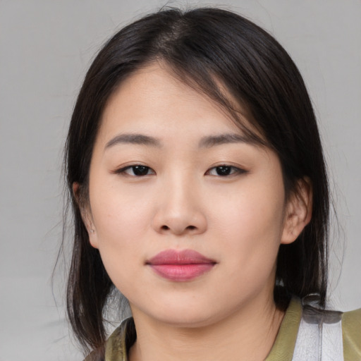 Neutral white young-adult female with medium  black hair and brown eyes