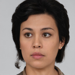 Neutral asian young-adult female with medium  black hair and brown eyes