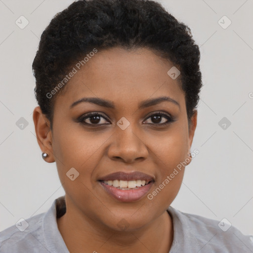 Joyful black young-adult female with short  brown hair and brown eyes