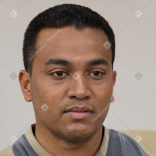 Neutral latino young-adult male with short  black hair and brown eyes
