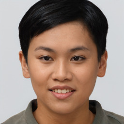 Joyful asian young-adult female with short  black hair and brown eyes