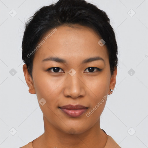 Joyful asian young-adult female with short  black hair and brown eyes