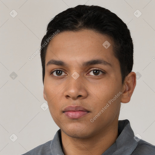 Neutral latino young-adult male with short  black hair and brown eyes