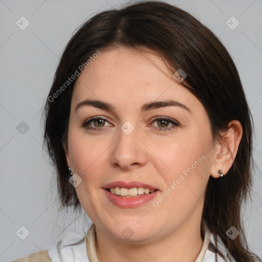 Joyful white young-adult female with medium  brown hair and brown eyes