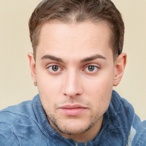 Neutral white young-adult male with short  brown hair and grey eyes