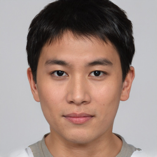 Neutral asian young-adult male with short  brown hair and brown eyes