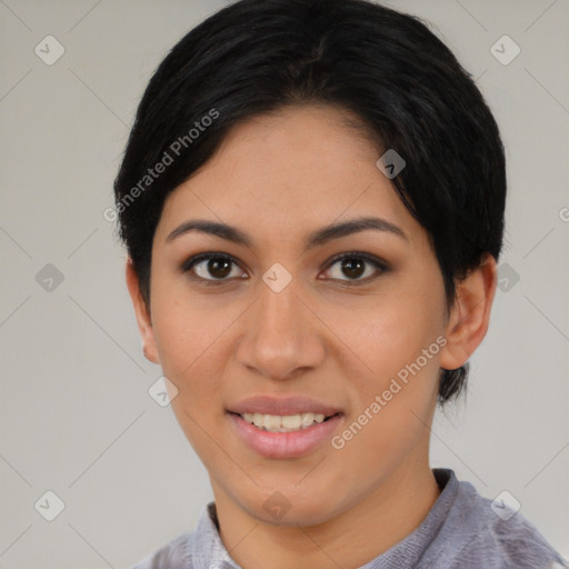 Joyful asian young-adult female with short  black hair and brown eyes