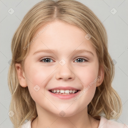 Joyful white child female with medium  brown hair and blue eyes