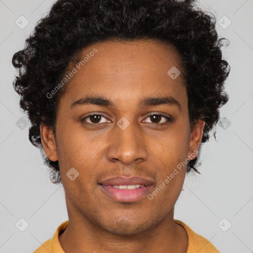 Joyful black young-adult male with short  brown hair and brown eyes