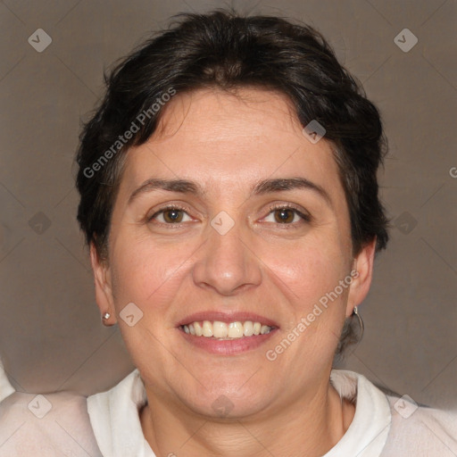 Joyful white adult female with short  brown hair and brown eyes