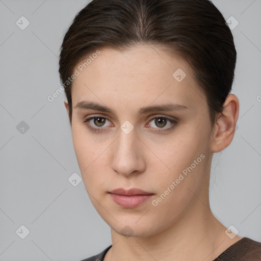 Neutral white young-adult female with short  brown hair and brown eyes