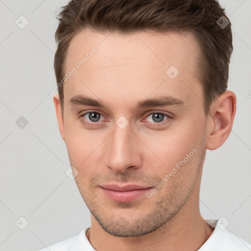 Neutral white young-adult male with short  brown hair and brown eyes