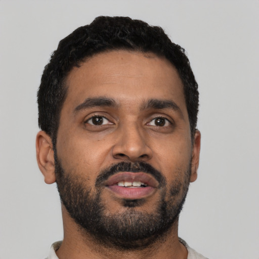 Neutral black young-adult male with short  black hair and brown eyes