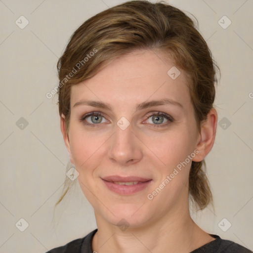 Joyful white young-adult female with medium  brown hair and grey eyes