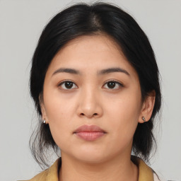 Neutral asian young-adult female with medium  black hair and brown eyes